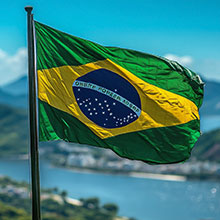 Die Flagge Brasiliens weht im Wind. Foto: Julia Zarubina/stock.adobe.com, KI-Bild.