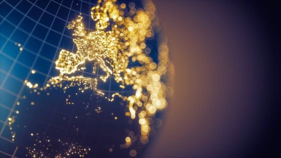 Detail of a globe on which countries and continents are brightly lit