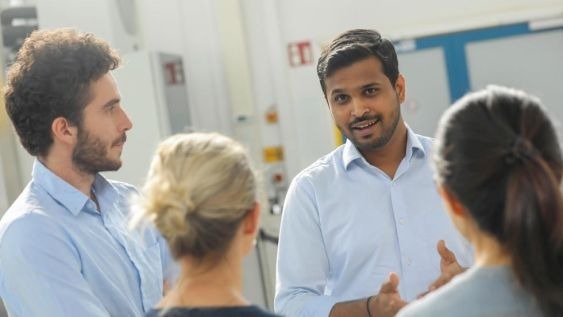 A group of people in conversation